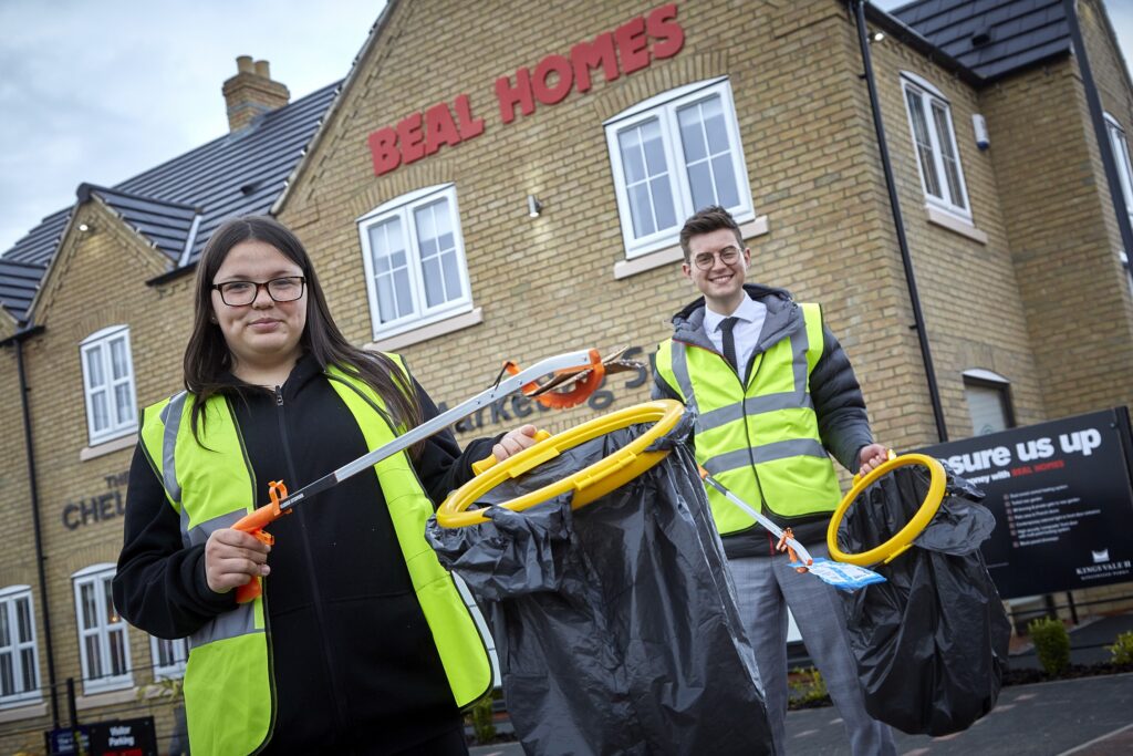 Harry Fawcett and Rebecca Larvin-Smith with their litter-picking equipment