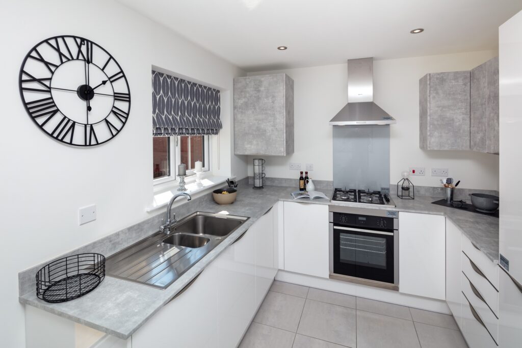 White and concrete-effect kitchen in The Chelsea house type